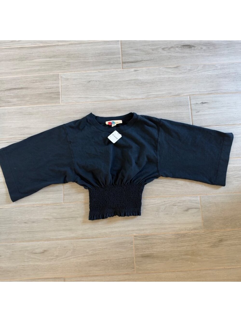 NWT FREE PEOPLE BEACH SMOCKED WIDE SLEEVE BLACK TOP SZ SMALL